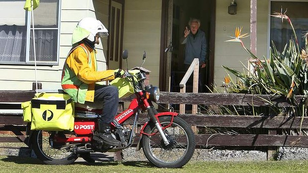 postie delivering mail to public
